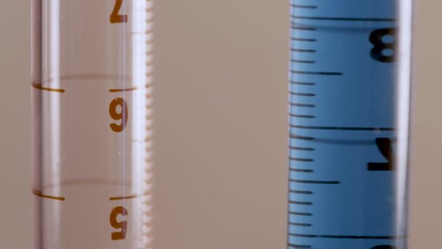 A test tube with a blue and red liquid