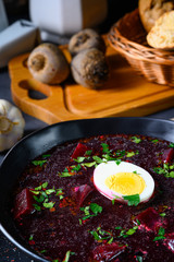 Delicious beetroot borscht with egg