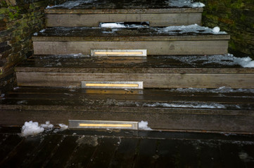 Illuminated slippery wooden steps