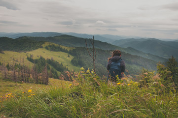 man on top of mountain