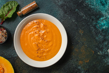 pumpkin or carrot soup (first course, delicious vegetable vitamin food) menu concept. food background. copy space. Top view