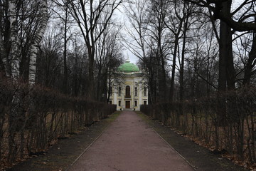 facade of an old building. yellow building fa&ccedil;ade. sculptures and decorative elements on the facade of buildings.