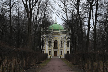 facade of an old building. yellow building fa&ccedil;ade. sculptures and decorative elements on the facade of buildings.