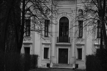 sculpture in kuskovo palace in Moscow. Black and white. facade of an old building. sculptures and decorative elements on the facade of buildings.   