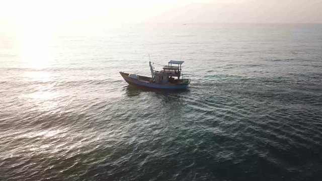 g boat in the ocean, fishermans workplace in mu ne vietnam