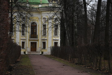 facade of an old building. yellow building fa&ccedil;ade. sculptures and decorative elements on the facade of buildings.