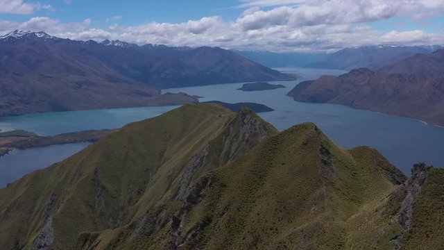 aerial view over roys peak in south new zealand, new zealands alps from above, aerial view over the mountains of new zealand
