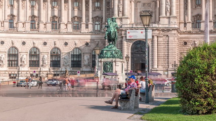 Fototapeta premium Equestrian statue of Prince Eugene of Savoy timelapse in front of Hofburg palace, Heldenplatz, Vienna, Austria.