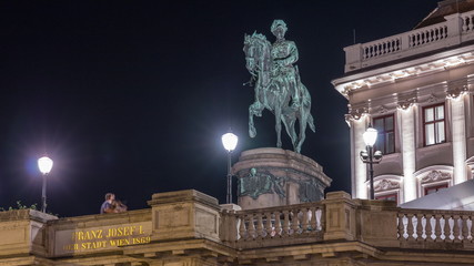 Night view of equestrian statue of Archduke Albert in front of the Albertina Museum timelapse in Vienna, Austria