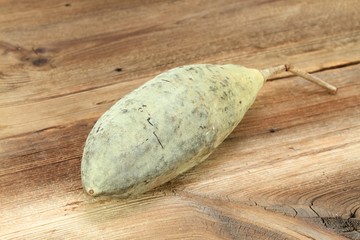 Baobab fruit, Adamsonia digitata, on the wooden table
