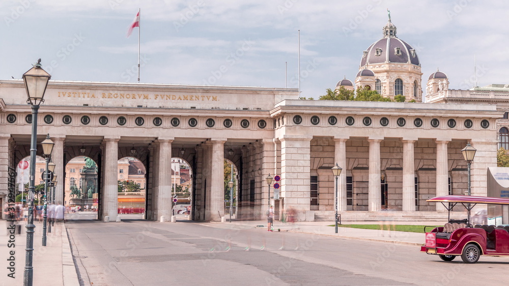 Wall mural exterior of outer castle gate with ringstrasse on background timelapse in vienna city in sunny day.