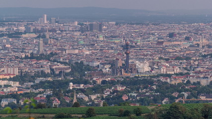 Skyline of Vienna from Danube Viewpoint Leopoldsberg aerial day to night timelapse.