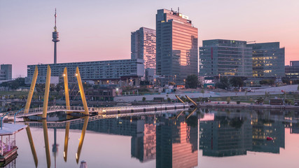 Donaustadt Danube City night to day timelapse is a modern quarter with skyscrapers and business...