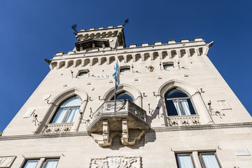 Government Building with the flag in San Marino, Public Palace (Palazzo Pubblico) with the blue sky - Image