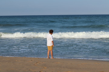 little boy at the shore