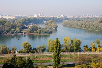 The confluence of the Sava River into the Danube seen Kalemegdan Park and Fortress in Belgrade,...