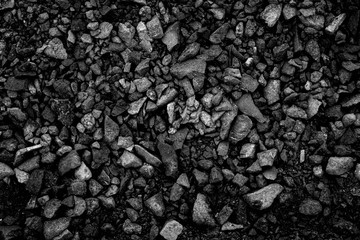 A heap of black natural coal, photo of coal mine background, texture