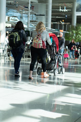 Women Walking with Baby Carriage
