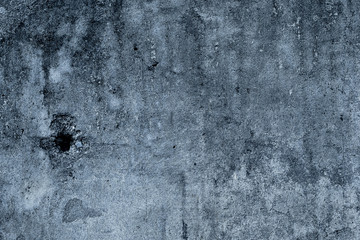 The wall has cracks. The gray background of the old wall. Design area.