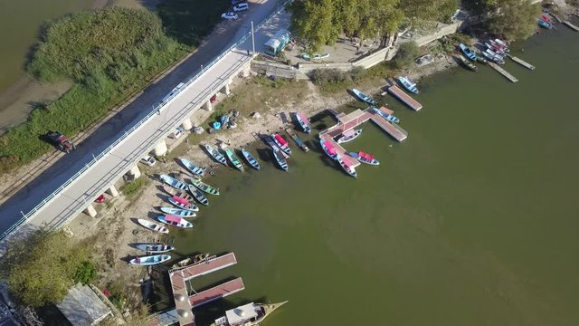Aerial view of the small marina at Golyazi Village, Turkey. Fixing the nets, painting the boats, preparing the fishhooks and trading fish is the daily routine
