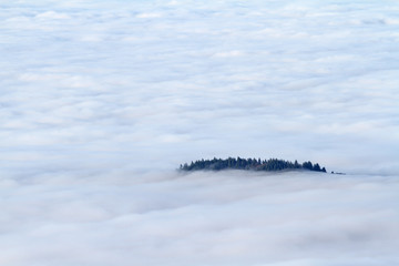Plakat Bergspitze im Nebelmeer
