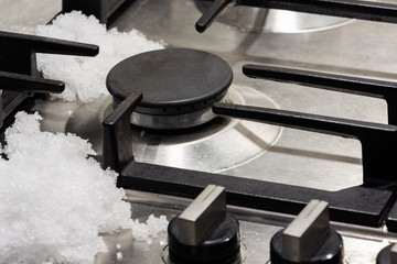 gas stove, no flame, turned off the gas, in a snowdrift.