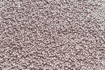 Gray polymer dye in granules, background texture