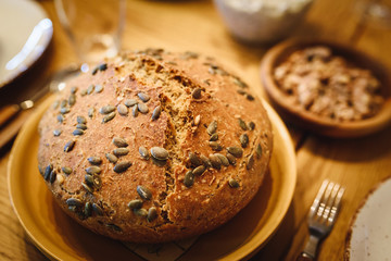 Homemade Multi-Seed Bread. Freshly baked homemade bread with pumpkin seeds on top.