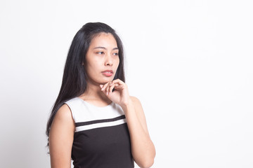 Serious  young Asian woman  look away.
