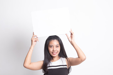 Young Asian woman with white blank sign.