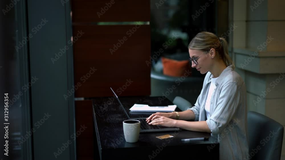 Wall mural caucasian woman typing text request on laptop computer for searching information on website using in