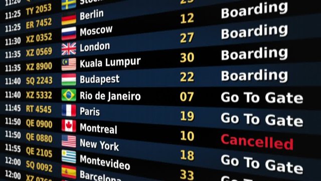 Airport departure board. Black and Blue. 2 videos in 1 file. Airport departure board showing time, flight number, city and country flag of the flight. More options in my portfolio.