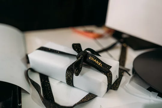 New York City, USA - January 02, 2020: Beautiful luxury Chanel gift with  proper packaging showing the brand on the ribbon. Perfect for Valentine day  or christmas. Stock-Foto