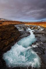 Fototapeta na wymiar Bruarfoss, a great turquoise waterfall in Iceland