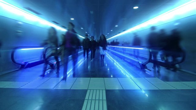 Flat escalator. Time lapse. Locked down. People riding a flat escalator. Blurred faces. More options in my portfolio.