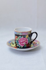 Mock up / design set of elegant and traditional colorful coffee cup & Tea cup on cup's plate , drink-ware , kitchen isolated on white background 