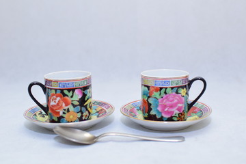 Mock up / design set of elegant and traditional colorful coffee cup & Tea cup on cup's plate , drink-ware , kitchen isolated on white background 