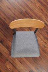 Gray cloth sit with wooden back chair