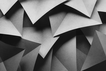 Geometric shapes made paper, dark background. - obrazy, fototapety, plakaty