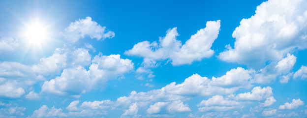 Obraz na płótnie Canvas Beautiful blue sky with white clouds and sun