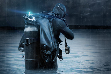 Fighter of a special unit is immersed in scuba diving. The concept of military operations,...
