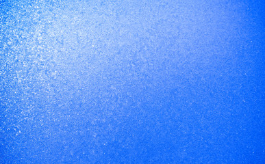 frost or frozen background of ice on window