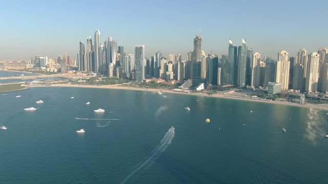 Dubai Marina seafront skyscrapers and the beachfront, aerial shot