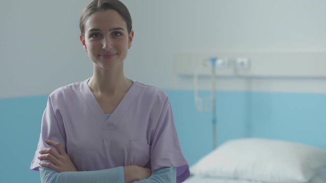 Professional young nurse smiling and posing at the hospital
