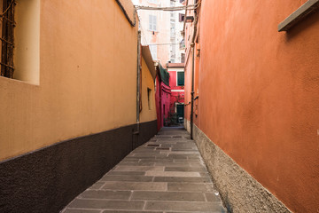 Fototapeta premium Narrow passage in an old Italian village. Cinque Terre, Italy