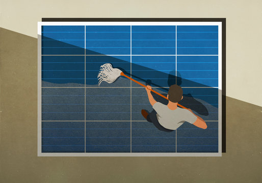 Man mopping solar panels