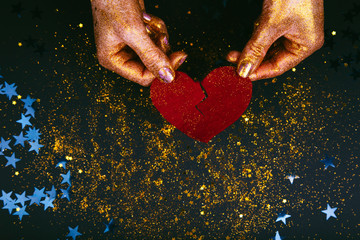 Broken heart on fastive background.