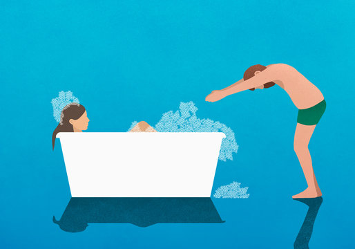 Husband preparing to dive into bubble bath with wife