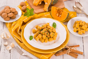 Pumpkin gnocchi with grated amaretti cookies.