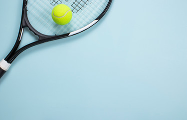 Tennis ball and racket isolated background. Top view